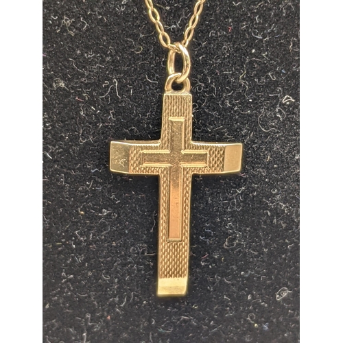 211 - A 9ct gold cross pendant on a 9ct gold necklace with a later clasp A/F, total weight 3.5g
Location:C... 