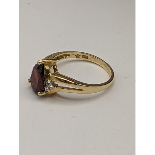 213 - A 10ct garnet ring, total weight 2.6g
Location:RING