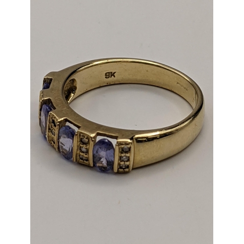 232 - A 9ct half eternity tanzanite ring, total weight 3.3g
Location:RING