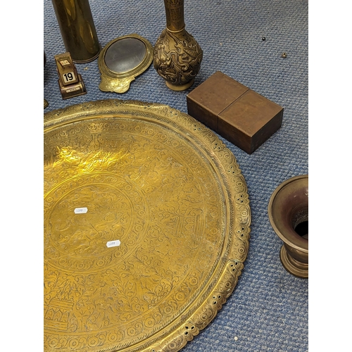 186 - Brassware to include an Indian tray, a pair of Oriental vases, candlesticks, a mirror and other item... 