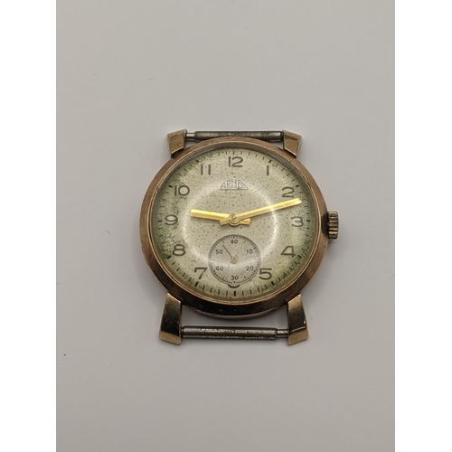 189 - A 9ct gold cased Arnex manual winding wristwatch, total weight 20.9g, together with a two sided silv... 