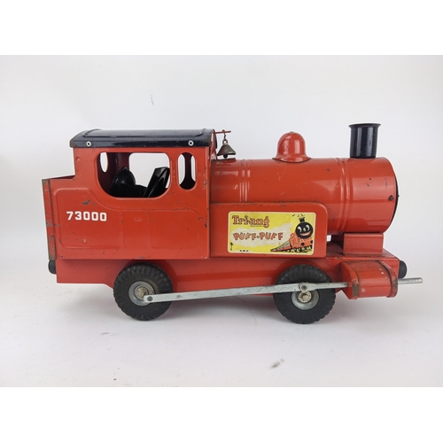 104 - A Tri-ang Puff-Puff red painted metal toy train, 45cm long
Location:LAB