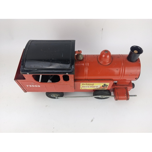 104 - A Tri-ang Puff-Puff red painted metal toy train, 45cm long
Location:LAB