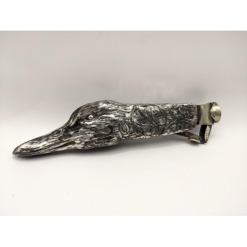 53 - An early 20th century cigar cutter in the form of ducks head decorated with flowers
Location:LWB