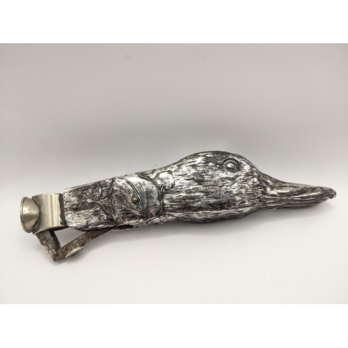 53 - An early 20th century cigar cutter in the form of ducks head decorated with flowers
Location:LWB