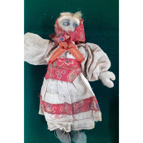 115 - A collection of worldwide and vintage dolls to include bisque and paper mâché examples, a Norah Well... 
