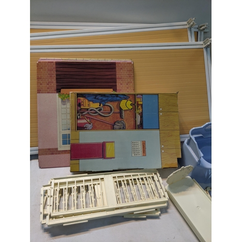 119 - A 1970's and later Sindy house and accessories to include a bath, wardrobe, double four poster bed, ... 