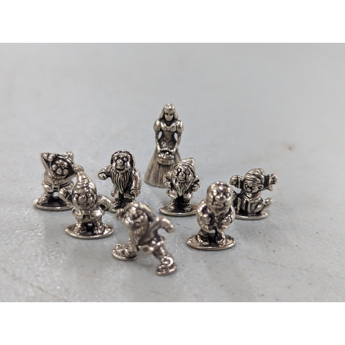 128 - A set of silver miniature figures of Snow White and Seven Dwarfs
Location:CAB2