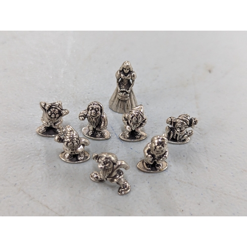 128 - A set of silver miniature figures of Snow White and Seven Dwarfs
Location:CAB2