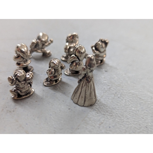 128 - A set of silver miniature figures of Snow White and Seven Dwarfs
Location:CAB2