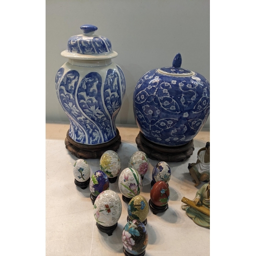 149 - Oriental items to include a Chinese blue and white ginger jar on a base, Satsuma candle sticks, a co... 