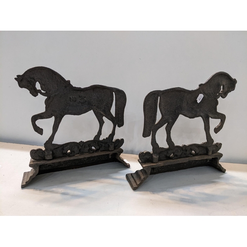 21 - A pair of Victorian cast iron doorstops fashioned as horses on stepped bases, 28.5cm h x 28.5cm w
Lo... 