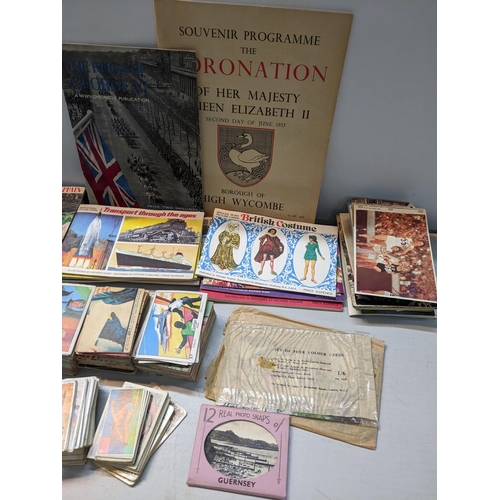 30 - A mixed lot to include cigarette cards loose and in albums, souvenir coronation programme, Anglo con... 