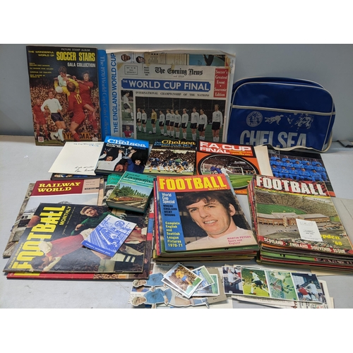 56 - A mixed lot of mainly football related items to include football monthly magazines, soccer stars gal... 