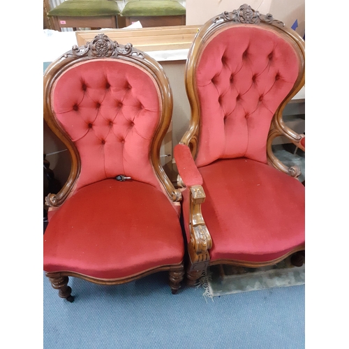 98 - A Victorian walnut salon armchair together with a matched nursing chair in red upholstery
Location: ... 