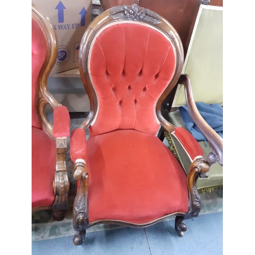 99 - A Victorian walnut button backed chair in red upholstery 
Location: A2F