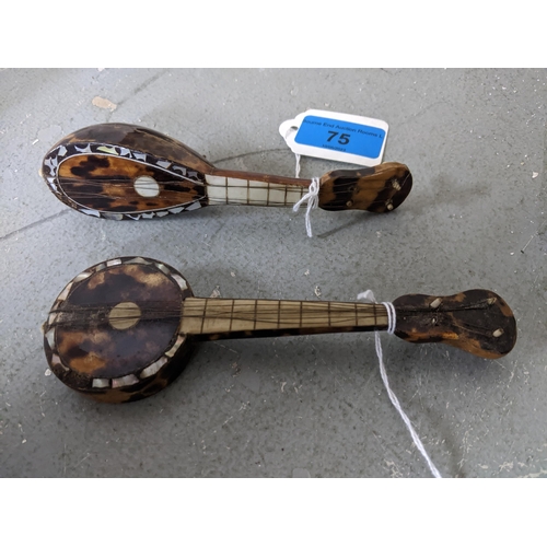 75 - Two Continental inlaid tortoiseshell and mother of pearl model banjo/ukulele musical instruments Loc... 
