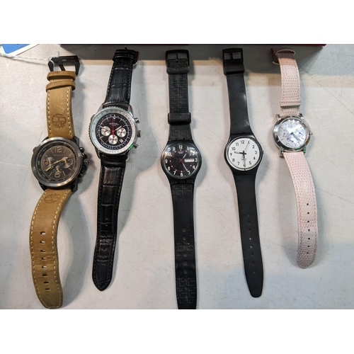 81 - A group of five quartz wristwatches to include a Rotary Aquaspeed Chronospeed watch, two Swatch watc... 