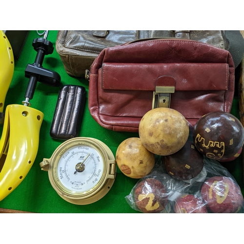 87 - A mixed lot to include a Dunhill cigar cutter, and one other, a Dunhill leather cigar case, brass ca... 