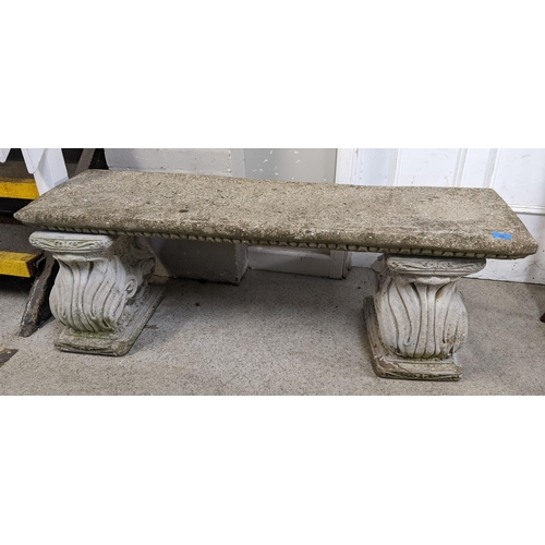 35 - A reconstituted stone garden bench, on scrolled ends, 40cm high, 127cm wide
Location:FOYER