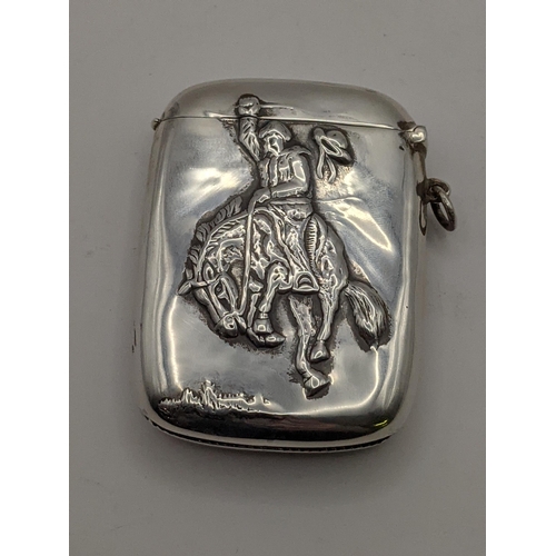 38 - A sterling silver vesta case with embossed detail of a man riding a horse, total weight 42g, Locatio... 