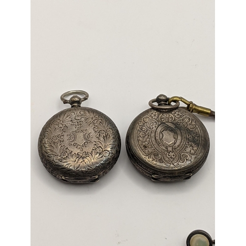 44 - Two late 18th/19th century Swiss silver ladies fob watches together with a pair of mother of pearl c... 