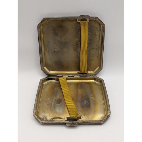 56 - A machine turned silver cigarette case, hallmarked Birmingham 1925, total weight 92.9g
Location:TABL... 