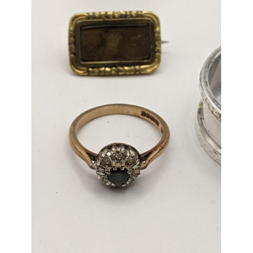 63 - A 9ct gold diamond and sapphire cluster ring, together with a yellow metal cameo brooch, total weigh... 