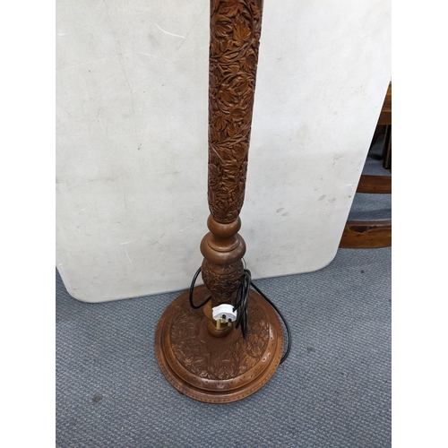 366 - A vintage Anglo-Indian carved hardwood stand lamp with vine decoration, re-wired and PAT-tested Loca... 