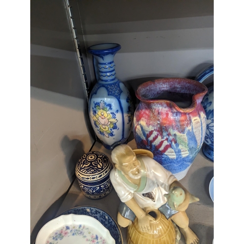 292 - Mixed ceramics to include Royal Copenhagen, Delft style jugs, Wedgwood and others, along with a cera... 