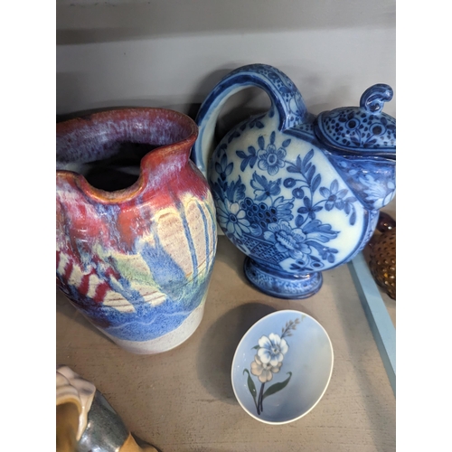 292 - Mixed ceramics to include Royal Copenhagen, Delft style jugs, Wedgwood and others, along with a cera... 