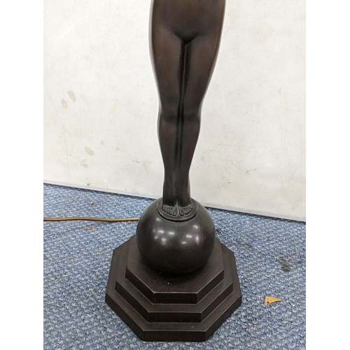 145 - An Art Deco style figural table lamp of a nude female on a stepped octagonal base, 70h excluding bul... 