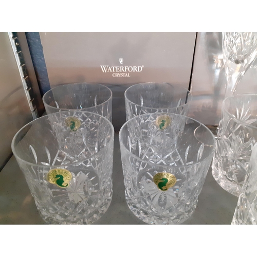 187 - A set of four Waterford Lismore tumblers with original box, mixed tumblers and a pair of Waterford N... 