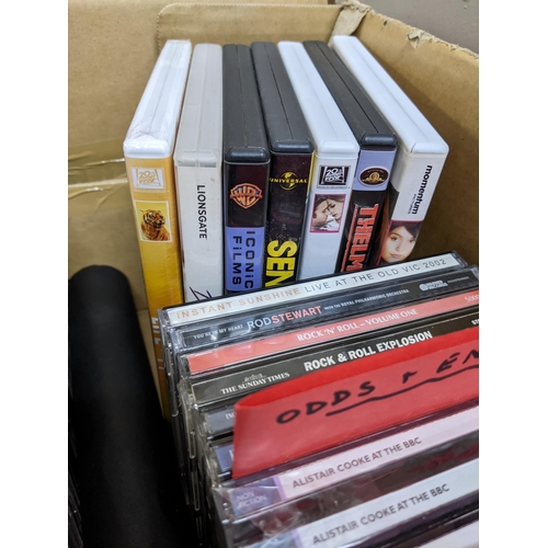 201 - A collection of classical CDs to include Vivaldi,  Mozart and others, along with seven DVDs and a bo... 