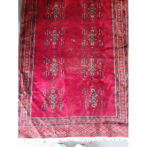 279 - Two 20th century red ground rugs to include a runner, 180cm x 95cm and 240cm x 80cm, 
Location: RAM