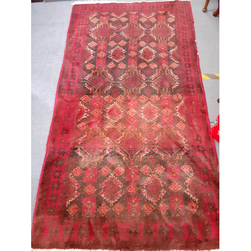 279 - Two 20th century red ground rugs to include a runner, 180cm x 95cm and 240cm x 80cm, 
Location: RAM