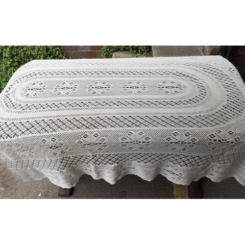 334 - A quantity of vintage lace tablecloths, mainly 1960's-1970's together with  knitwear and clothing, t... 