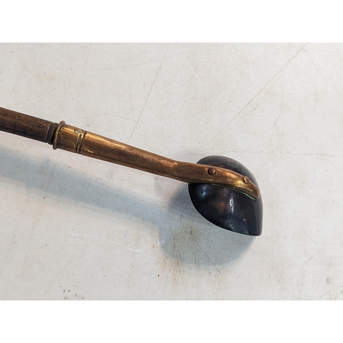 331 - A copper ladle with a turned wooden handle
Location:LWM