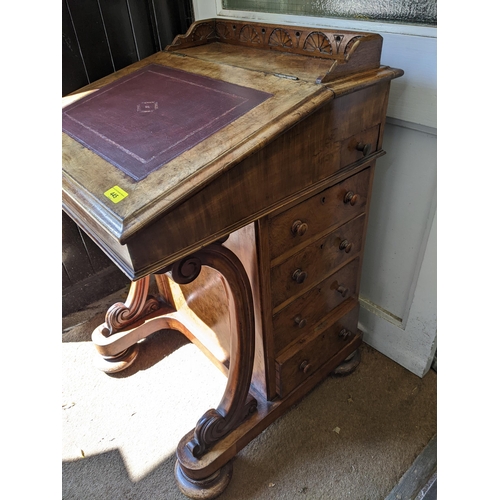 323 - A Victorian walnut Davenport with four side drawers, on button feet, 68cm x 59cm x 59cm
Location:FOY... 