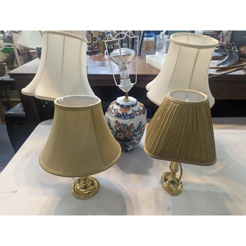 306 - A pair of vintage centa style stacking stools together with a group of five lamps to include a ceram... 