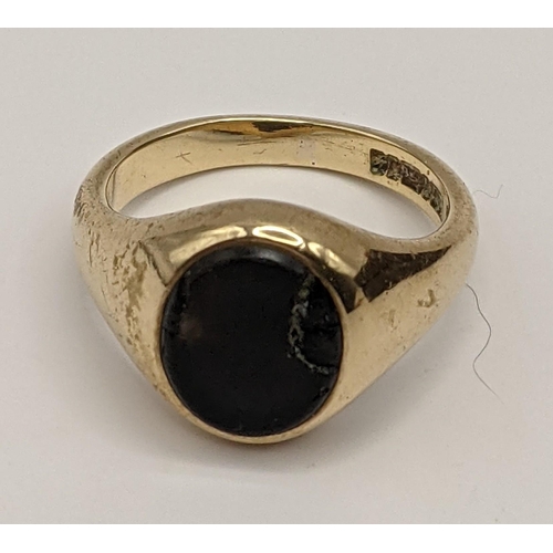 13 - A 9ct gold signet ring set with a stone, A/F, 8.6g, Location:RING