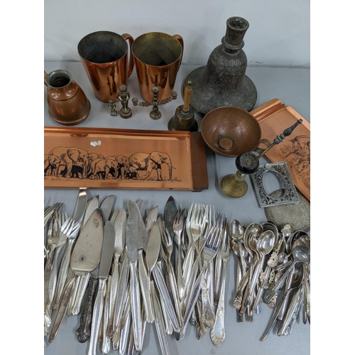 174 - A mixed lot of metalware to include large copper mugs, Turkish coffee maker, a quantity of cutlery a... 