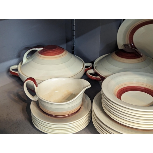 234 - A group of Susie Cooper red wedding band items to include plates, bowls, tureens, jug and others
Loc... 