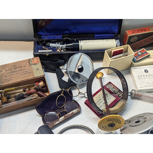 240 - A large quantity of doctors items and related to include stethoscope, otoscope, hypodermic needles, ... 