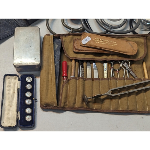 240 - A large quantity of doctors items and related to include stethoscope, otoscope, hypodermic needles, ... 