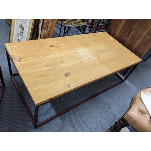 261 - A modern loaf coffee table on a metal frame, 40h x 130w and a pair of matching side tables, 49.5h x ... 