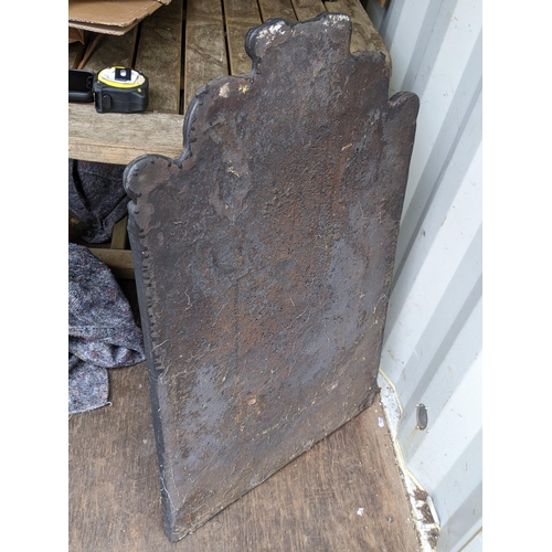 303 - A 19th century cast iron fireback having a nautical design and an arched top, 88h x 54.5w, Location:... 