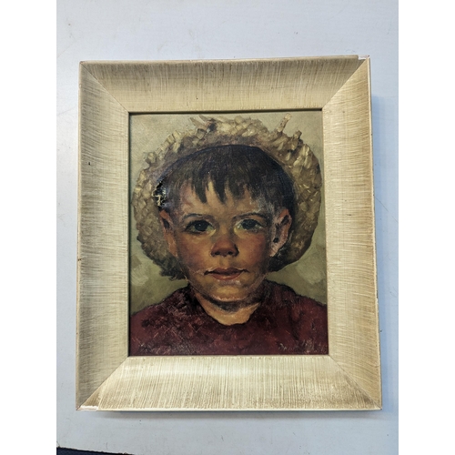 321 - A vintage circa 1960s oil on canvas of a young boy wearing a straw hat in a plaster frame, A/F, 31.5... 