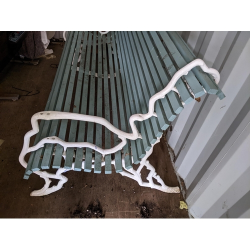 362 - A Victorian Coalbrookdale style garden bench having a white painted faux branch work cast iron frame... 