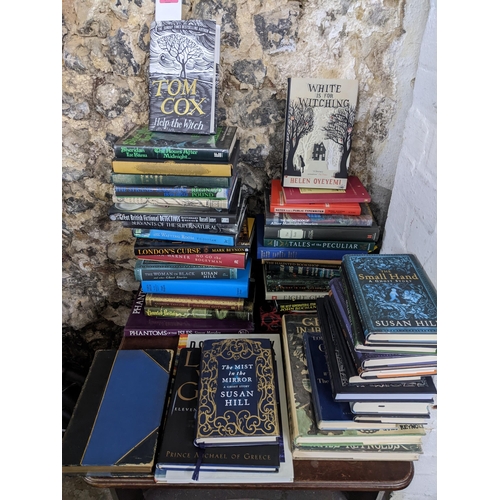 374 - A collection of books on ghosts, novels, witches and other related books to include Susan Hill novel... 